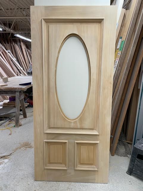 Facroy Direct Doors SOLID ASH 2 PANEL BOTTOM 34 LITE TOP WITH BOLECTION MOULDING